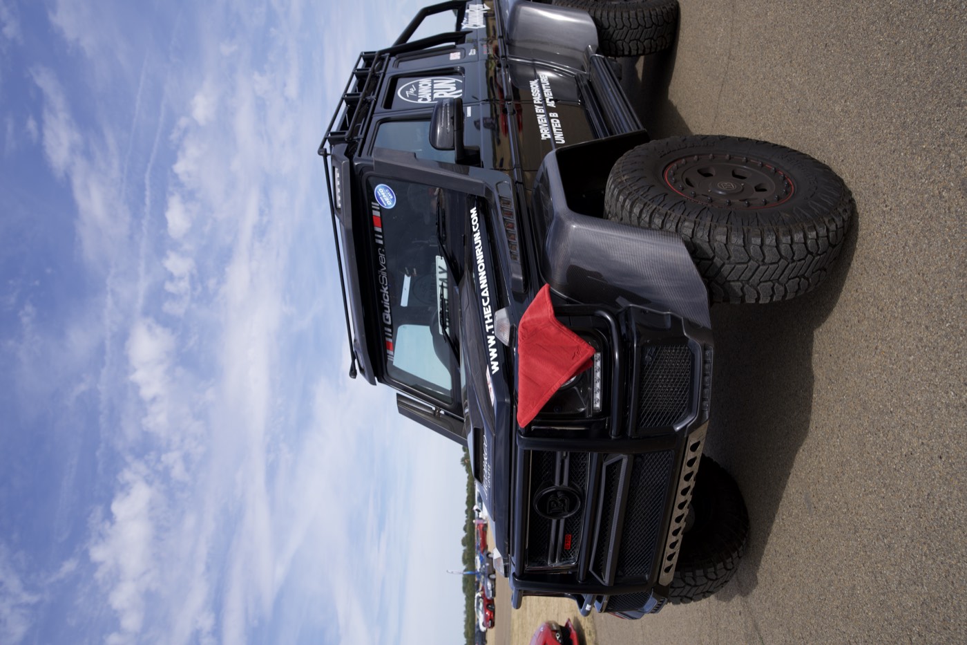 Brabus 700 6x6 Cannon Run truck front end with a wype towel on the grille