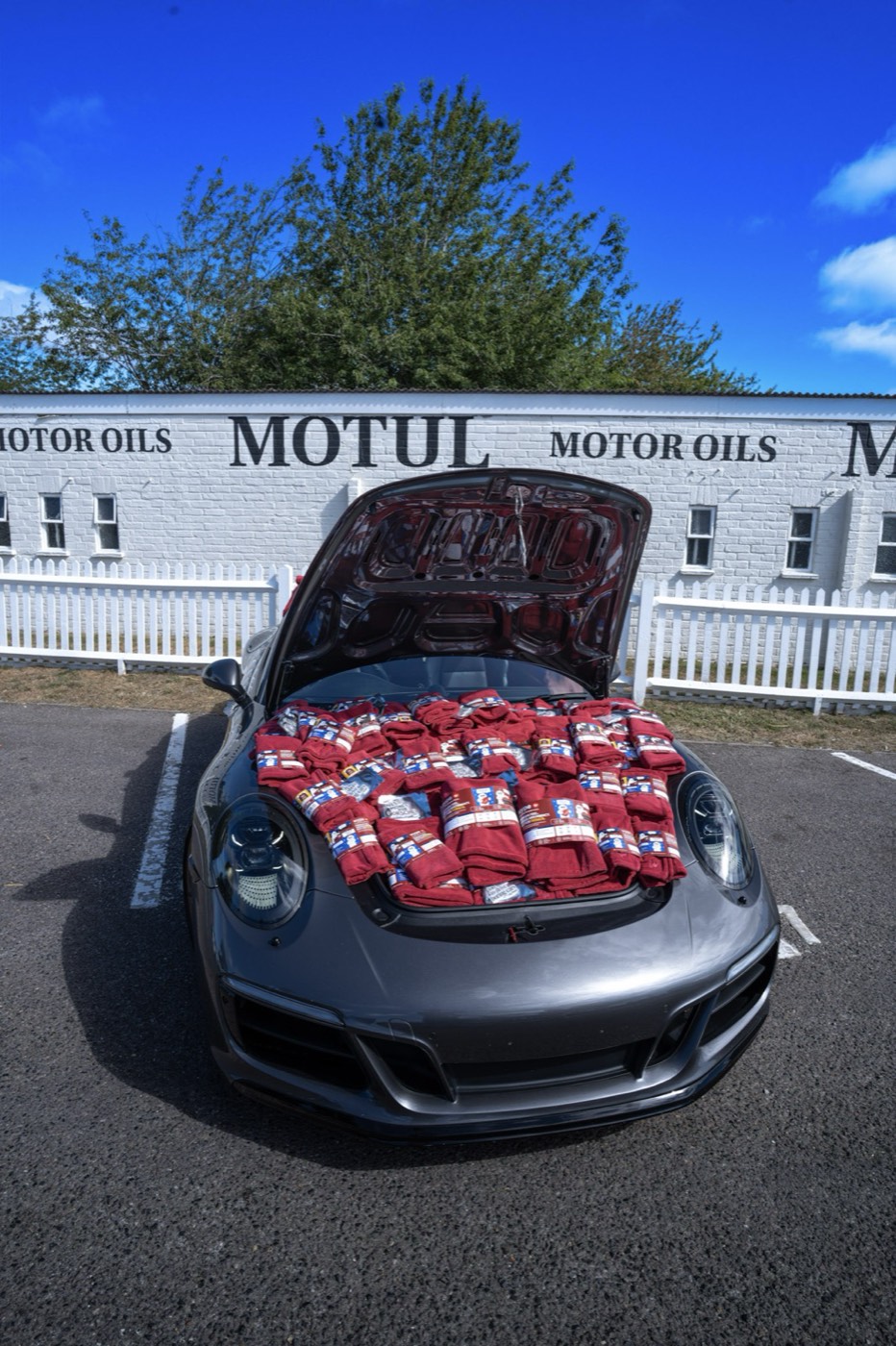 wype towels laid out in the front boot of a Porsche 911 at Goodwood